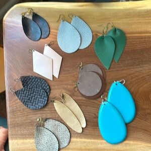 9 pairs of earrings 8 sets of leather earrings and 1 pair of turquoise wood